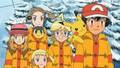 Clemont in an orange snowsuit with Ash, Serena, Alexa, and Bonnie.