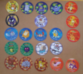 Some tazos from the first and second sets of Pokémon Tazo