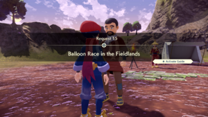 A man in a brown outfit labeled "Balloon Race" at the Heights Camp.