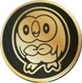 MCD22 Cardboard Rowlet Coin.jpg